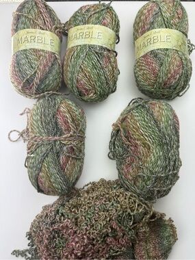 6 skeins of James C. Brett “Marble” yarn